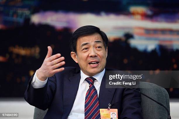 Chongqing Municipality Communist Party Secretary Bo Xilai attends a meeting during the annual National People's Congress at the Great Hall of the...