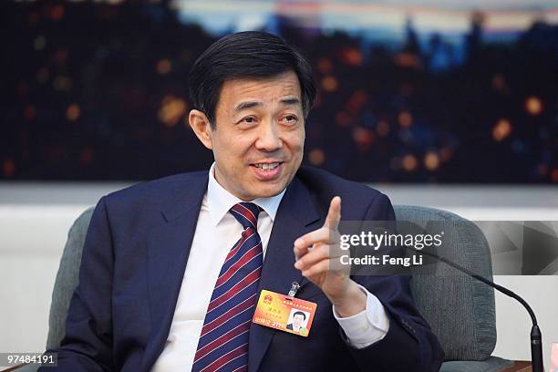 Chongqing Municipality Communist Party Secretary Bo Xilai attends a meeting during the annual National People's Congress at the Great Hall of the...