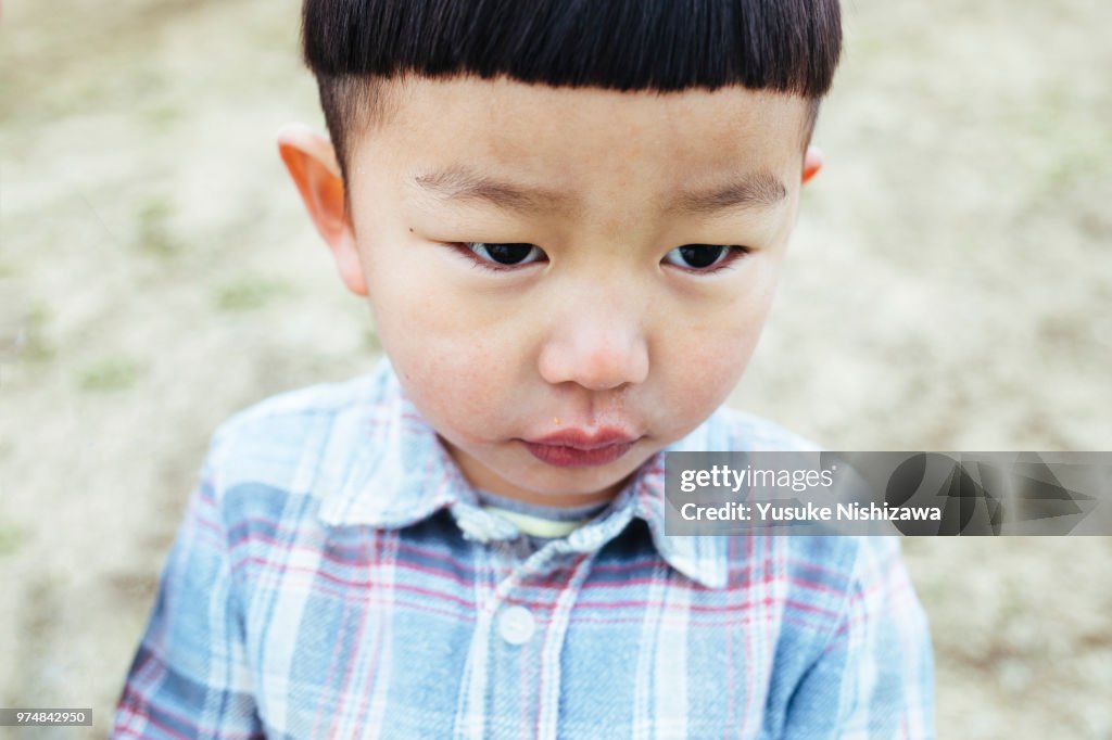 A boy looking at a point