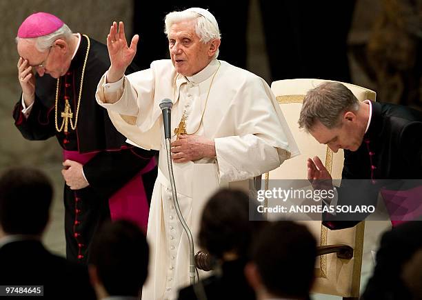 Pope Benedict XVI blesses the head of the Italian Civil Protection Guido Bertolaso and volunteers of the Italian organization during the Audience in...