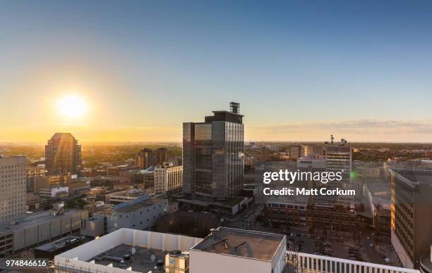 skyline at sunset, winnipeg, manitoba, canada - winnipeg stock pictures, royalty-free photos & images
