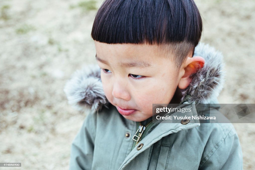 A boy looking at a point