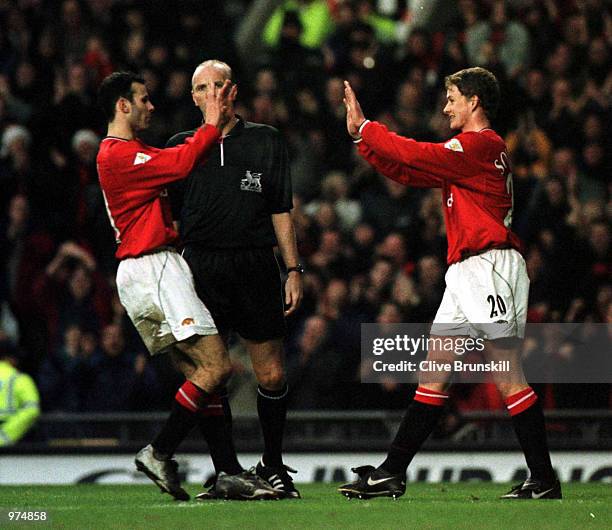 Ole Gunnar Solskjaer of Man Utd celebrates with Ryan Giggs after scoring the first goal during the Manchester United v Ipswich Town FA Carling...