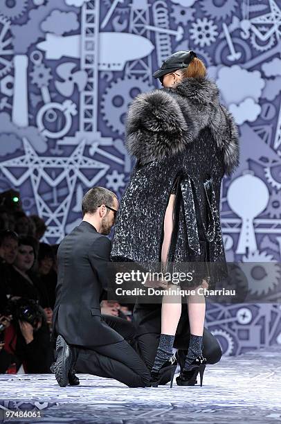 Designers Viktor & Rolf and model perform during the Viktor & Rolf Ready to Wear Show as part of the Paris womens wear Fashion Week Fall Winter 2011...