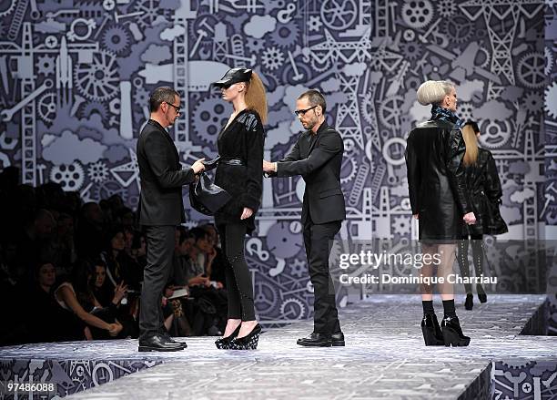 Designers Viktor & Rolf and model perform during the Viktor & Rolf Ready to Wear Show as part of the Paris womens wear Fashion Week Fall Winter 2011...