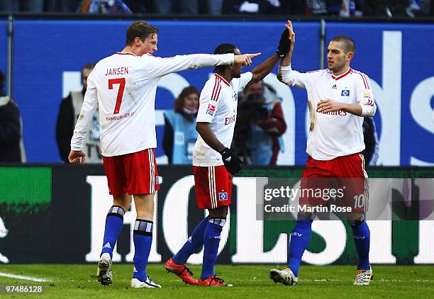 Marcell Jansen of Hamburg celebrates after he scores his team's opening goal during the Bundesliga match between Hamburger SV and Hertha BSC Berlin...