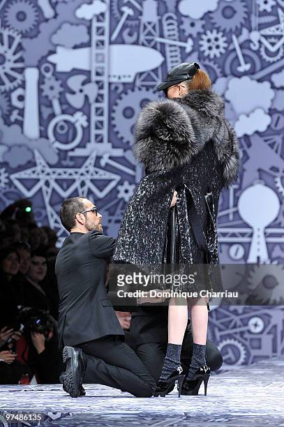Designers Viktor & Rolf and model perform during the Viktor & Rolf Ready to Wear Show as part of the Paris womens wear Fashion Week Fall Winter 2011...