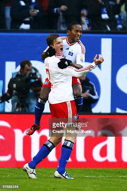 Marcell Jansen of Hamburg celebrates after he scores his team's opening goal during the Bundesliga match between Hamburger SV and Hertha BSC Berlin...