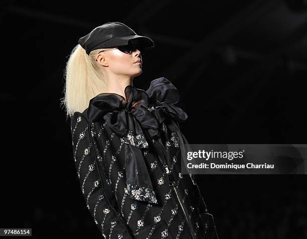 Designers Viktor & Rolf and model perform during the Viktor & Rolf Ready to Wear Show as part of the Paris womens wear Fashion Week Fall Winter 2011...