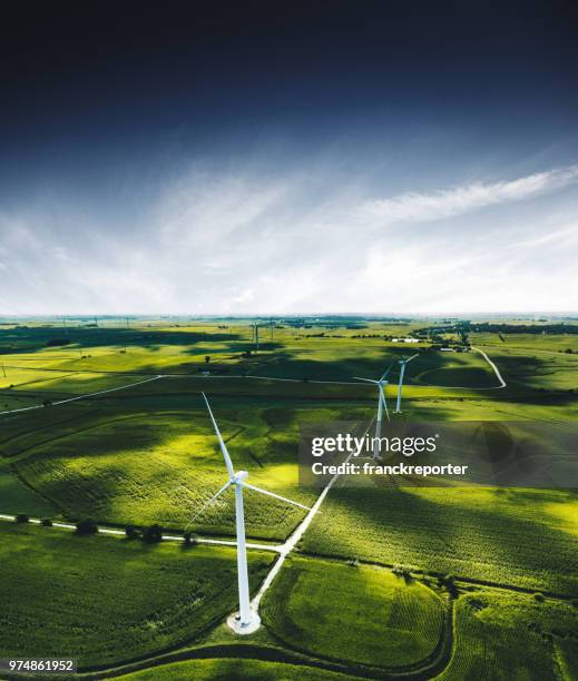 wind turbine field - helicopter point of view stock pictures, royalty-free photos & images