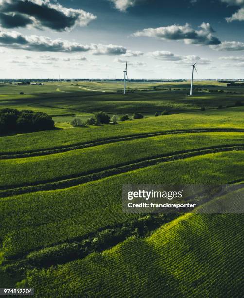wind turbine field - helicopter point of view stock pictures, royalty-free photos & images
