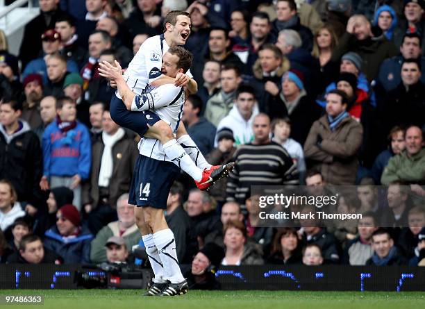 Jack Wilshere of Bolton Wanderers celebrates his goal with team mate Kevin Davies during the Barclays Premier League match between West Ham United...
