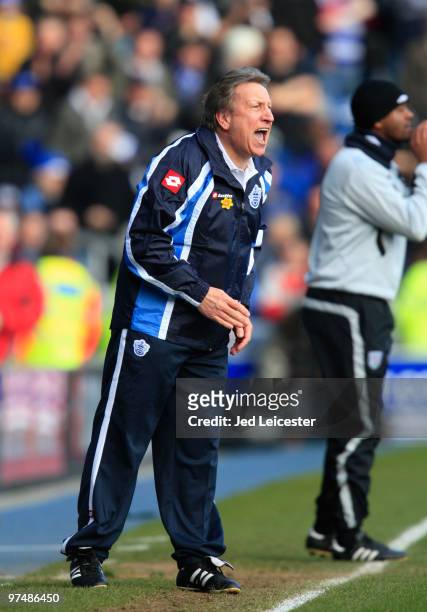 Manager Neil Warnock shouts instructions from the touchline during the Coca Cola Championship match between Queens Park Rangers and West Bromwich...