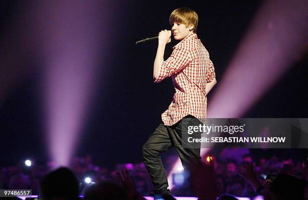 Canadian musician Justin Bieber performs on stage at the "The Dome" music show in Berlin on March 5, 2010. AFP PHOTO DDP / SEBASTIAN WILLNOW GERMANY...