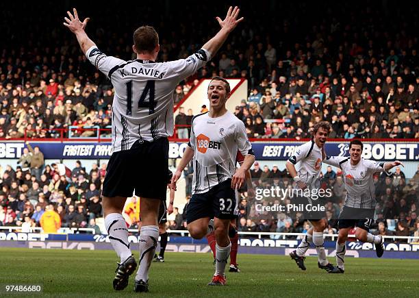 Jack Wilshere of Bolton Wanderers celabrates scoring his goal with Kevin Davies during the Barclays Premier League match between West Ham United and...