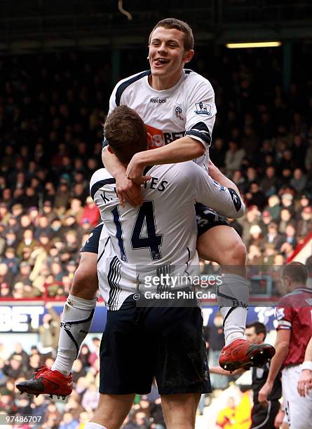 Jack Wilshere of Bolton Wanderers celabrates scoring his goal with Kevin Davies during the Barclays Premier League match between West Ham United and...