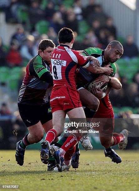 Jordan Turner-Hall of Harlequins is tackled during the Guinness Premiership match between Harlequins and Worcester Warriors at The Stoop on March 6,...