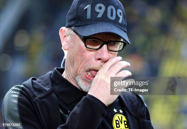 Head coach Peter Stoeger of Dortmund gestures prior to the Bundesliga match between Borussia Dortmund and VfB Stuttgart at Signal Iduna Park on April...