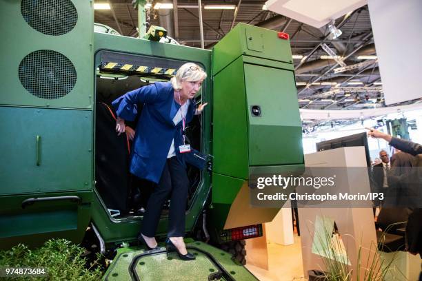 French Member of Parliament and president of the French far-right Rassemblement National party Marine Le Pen visits at the Eurosatory 2018 Show, on...