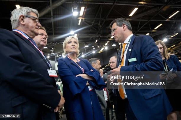 French Member of Parliament and president of the French far-right Rassemblement National party Marine Le Pen visits at the Eurosatory 2018 Show, on...