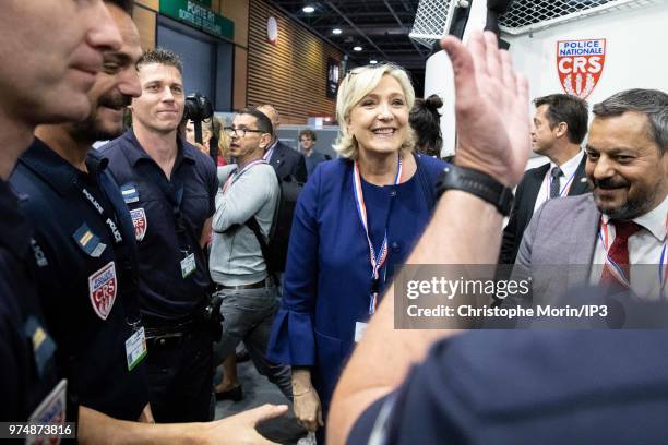 French Member of Parliament and president of the French far-right Rassemblement National party Marine Le Pen visits at the Eurosatory 2018 Show, on...