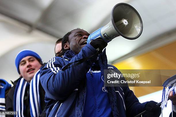 Gerald Asamoah of Schalke celebrates the 4:1 victory after the Bundesliga match between Eintracht Frankfurt and FC Schalke at the Commerzbank Arena...