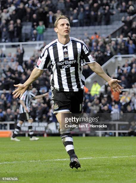 Peter Lovenkrands of NewcastleUnited celebrates after scoring the second goal during the Coca-Cola championship match between Newcastle United and...