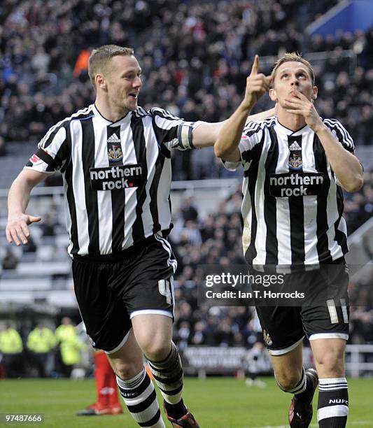 Peter Lovenkrands of Newcastle United celebrates after scoring the second goal during the Coca-Cola championship match between Newcastle United and...