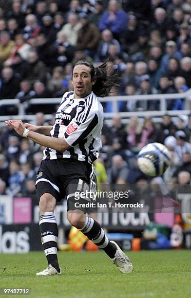 Jonas Gutierrez of Newcatle United scores the fourth goal during the Coca-Cola championship match between Newcastle United and Barnsley at St James'...