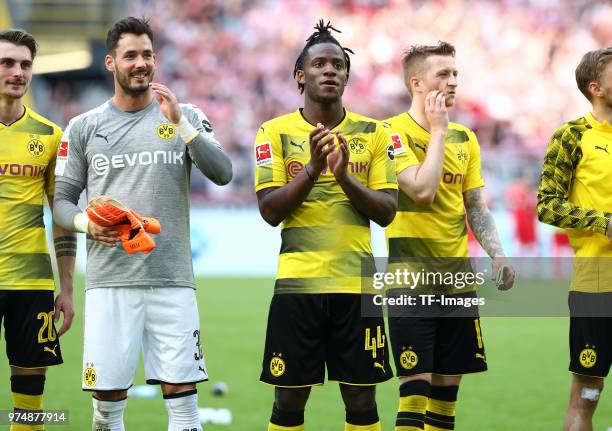 Maximilian Philipp of Dortmund, Goalkeeper Roman Buerki of Dortmund, Michy Batshuayi of Dortmund, Marco Reus of Dortmund celebrate after winning the...