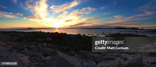 iphone 5 pano - oceanstone sunset - sea iphone stock-fotos und bilder