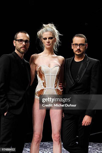 Kristen McMenamy and Viktor & Rolf attend the Viktor & Rolf Ready to Wear show as part of the Paris Womenswear Fashion Week Fall/Winter 2011 at...