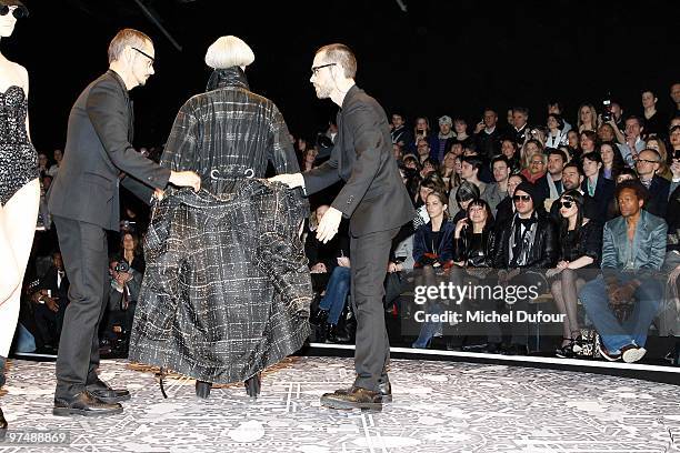 Kristen McMenamy, Viktor & Rolf and a model walk the runway during the Viktor & Rolf Ready to Wear show as part of the Paris Womenswear Fashion Week...