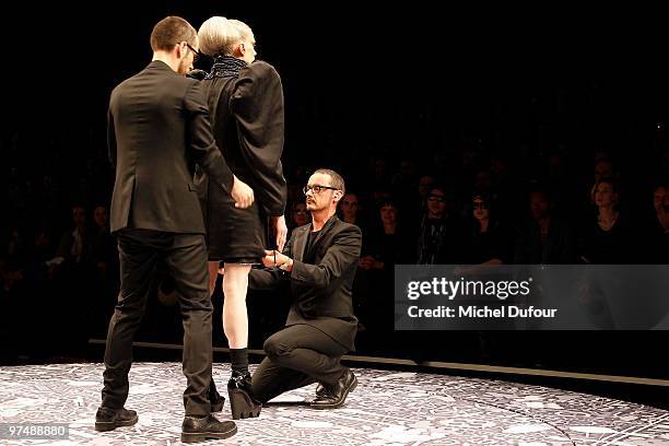 Kristen McMenamy, Viktor & Rolf and a model walk the runway during the Viktor & Rolf Ready to Wear show as part of the Paris Womenswear Fashion Week...