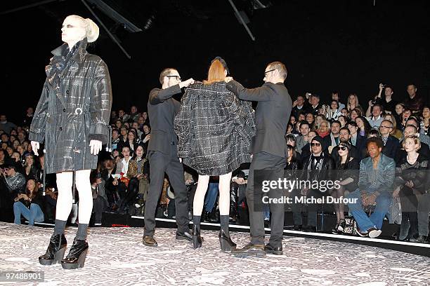 Kristen McMenamy, Viktor & Rolf and a model walk the runway during the Viktor & Rolf Ready to Wear show as part of the Paris Womenswear Fashion Week...