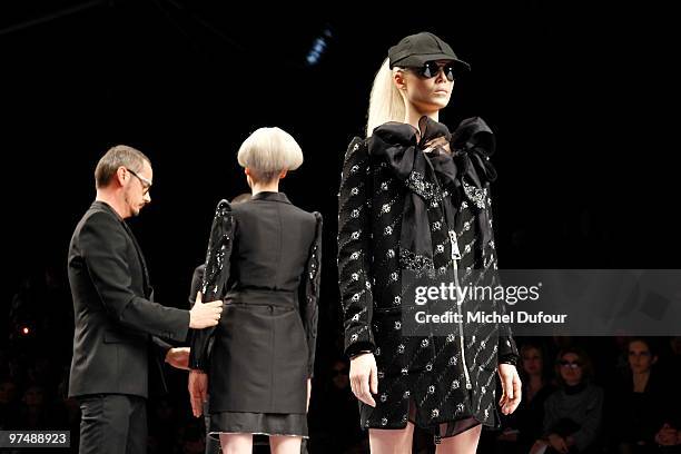 Kristen McMenamy, Viktor & Rolf and a model walk the runway during the Viktor & Rolf Ready to Wear show as part of the Paris Womenswear Fashion Week...