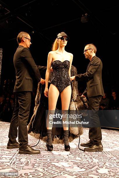 Kristen McMenamy, Viktor & Rolf and a model walk the runway during the Viktor & Rolf Ready to Wear show as part of the Paris Womenswear Fashion Week...