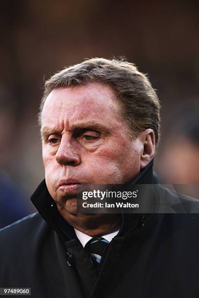 Harry Redknapp the Tottenham Hotspur manager walks to the dugouts before the FA Cup sponsored by E.ON Quarter Final match between Fulham and...