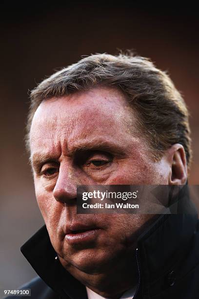 Harry Redknapp the Tottenham Hotspur manager walks to the dugouts before the FA Cup sponsored by E.ON Quarter Final match between Fulham and...