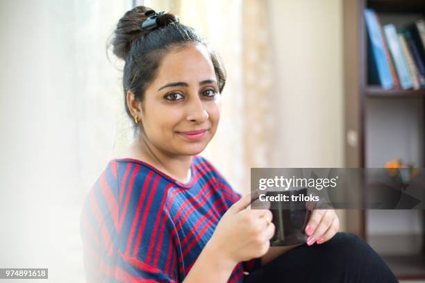 woman drinking coffee - tears happiness stock pictures, royalty-free photos & images