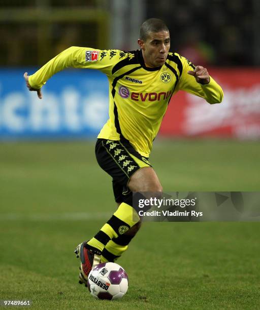 Mohamed Zidan of Dortmund runs with the ball during the Bundesliga match between Borussia Dortmund and Borussia Moenchengladbach at Signal Iduna Park...