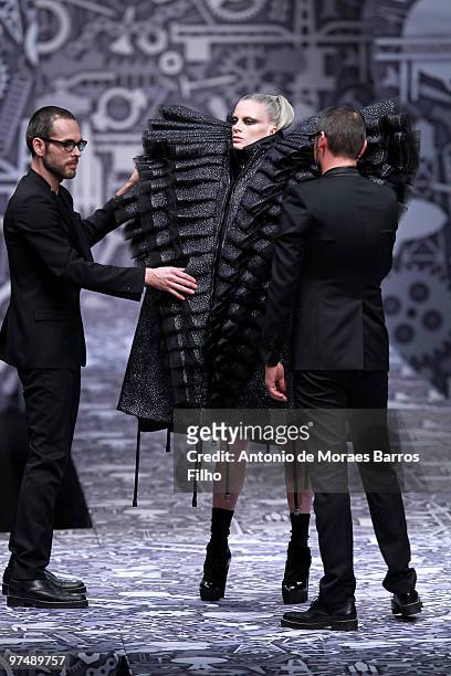 Designers Viktor & Rolf and model Kristen McMenamy perform during the Viktor & Rolf Ready to Wear show as part of the Paris Womenswear Fashion Week...