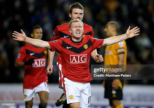 Paul Scholes of Manchester United celebrates scoring his team's first goal and his 100th Premier League goal during the FA Barclays Premier League...