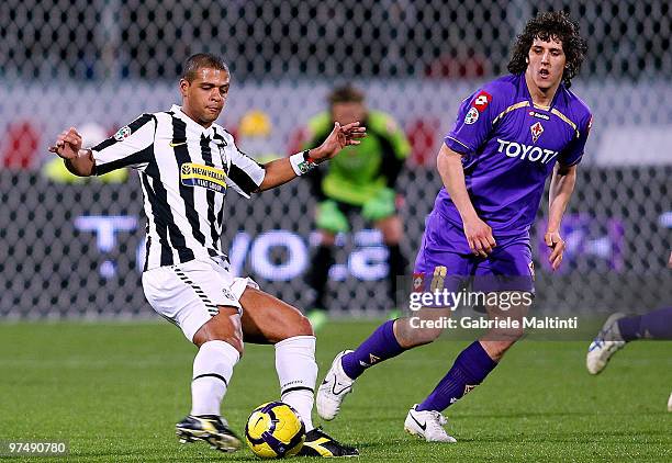 Stevan Jovetic of ACF Fiorentina battles for the ball with Felipe Melo of Juventus FC during the Serie A match between ACF Fiorentina and Juventus FC...