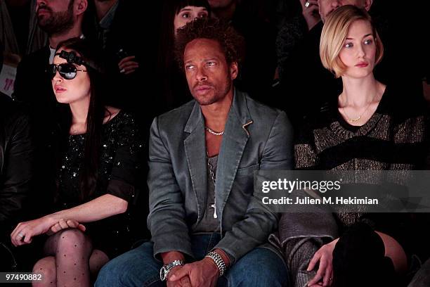 Lindsay Lohan and Gary Dourdan attend the Viktor & Rolf Ready to Wear show as part of the Paris Womenswear Fashion Week Fall/Winter 2011 at Espace...