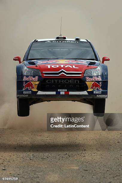 Sebastien Loeb of France and Daniel Elena of Monaco compete in their Citroen C4 Total during the second day of the WRC Rally Mexico 2010 on March 6,...