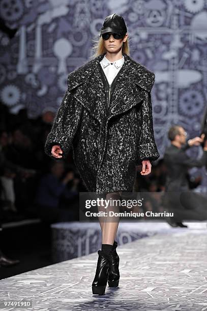 Model walks the runway during the Viktor & Rolf Ready to Wear Show as part of the Paris womens wear Fashion Week Fall Winter 2011 at Espace Ephemere...