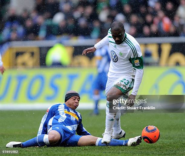 Grafite of Wolfsburg is challenged by Joel Epalle of Bochum during the Bundesliga match between VfL Wolfsburg and VfL Bochum at Volkswagen Arena on...