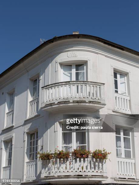 balcony with flower pots - mondonedo stock pictures, royalty-free photos & images