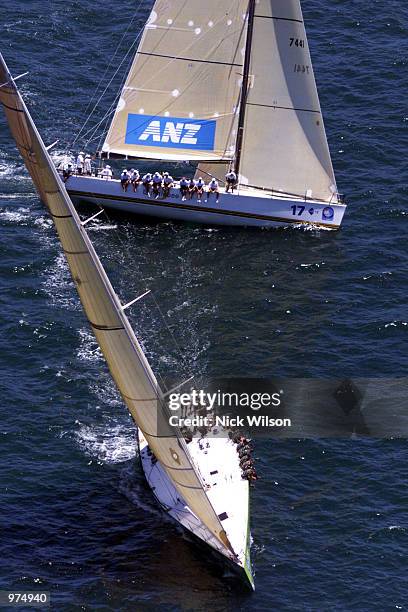 Shockwave tacks infront of Bubllebee 5 as they make their way to Sydney heads after the start of the Sydney Hobart Yacht Race on Sydney Harbour...